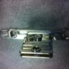 Links front bevestiging Mepla/Grass: metalen frontbevestiging met stelschroeven en twee schroefgaten